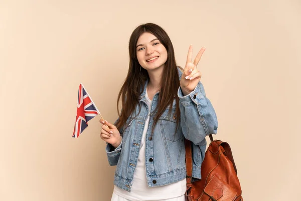 Ein Junges Ukrainisches Mädchen Mit Einer Britischen Flagge Auf Beigem — Stockfoto