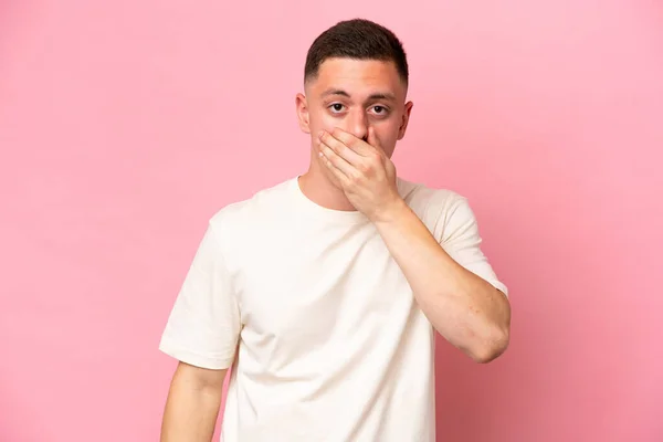 Young Brazilian Man Isolated Pink Background Covering Mouth Hand — Stock Photo, Image