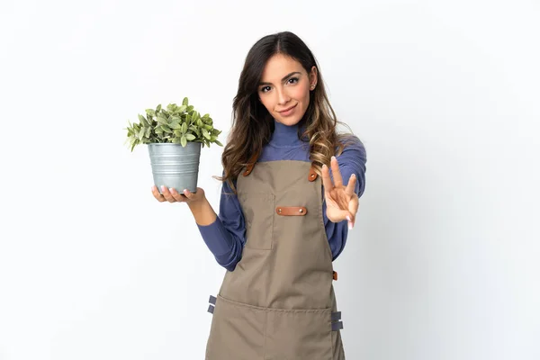 Gardener Girl Holding Plant Isolated White Background Happy Counting Three — Foto de Stock