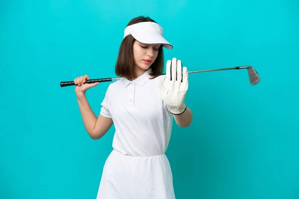 Młoda Ukraińska Golfistka Kobieta Odizolowana Niebieskim Tle Zatrzymać Gest Rozczarowany — Zdjęcie stockowe