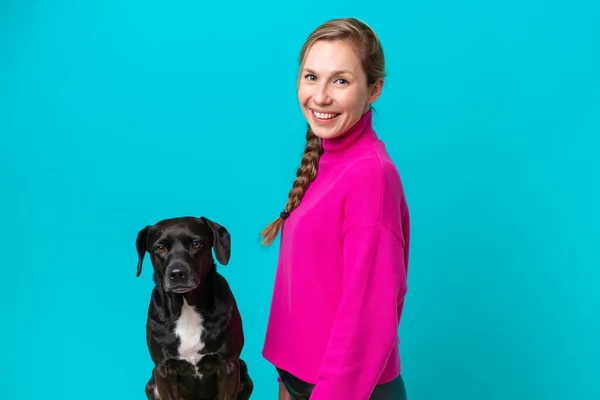 Young Caucasian Woman Her Dog Isolated Blue Background Smiling Lot — Zdjęcie stockowe