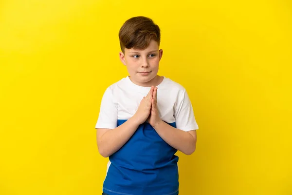 Little Redhead Boy Isolated Yellow Background Scheming Something — стоковое фото