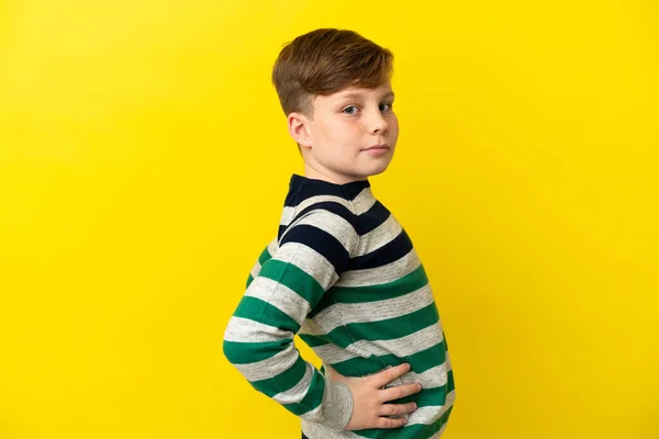 Little Redhead Boy Isolated Yellow Background Suffering Backache Having Made — Foto de Stock