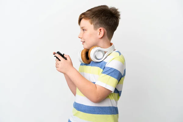 Little Redhead Boy Holding Game Pad Isolated White Background Looking — 图库照片