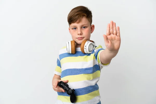 Little Redhead Boy Holding Game Pad Isolated White Background Making — Stockfoto
