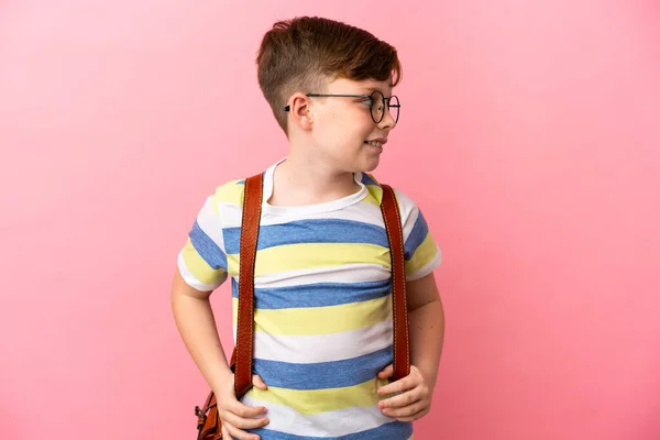 Little Redhead Caucasian Boy Isolated Pink Background Looking Side — ストック写真