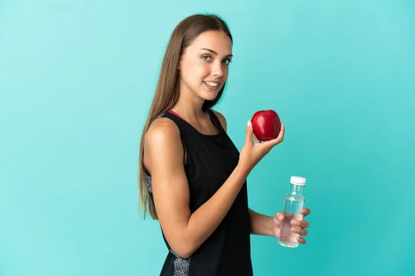 Jonge Vrouw Geïsoleerde Blauwe Achtergrond Met Een Appel Met Een — Stockfoto