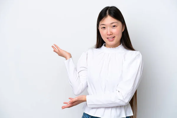 Young Chinese Woman Isolated White Background Extending Hands Side Inviting — Stockfoto