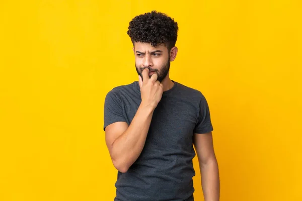 Young Moroccan Man Isolated Yellow Background Nervous Scared — Stock Photo, Image