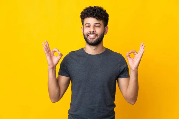 Young Moroccan Man Isolated Yellow Background Zen Pose — Stockfoto