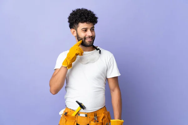 Young Electrician Moroccan Man Isolated Purple Background Thinking Idea While — Stock Fotó