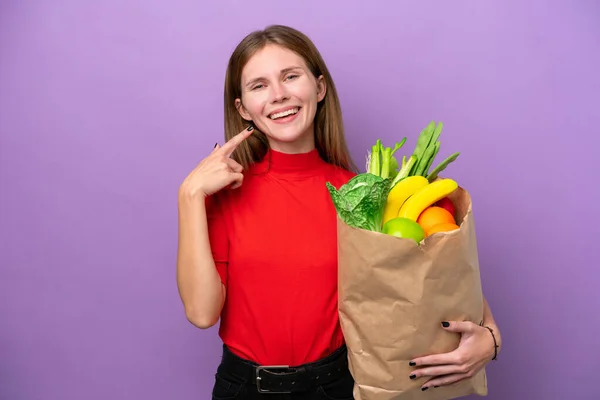 Young English Woman Holding Grocery Shopping Bag Isolated Purple Background — Stockfoto