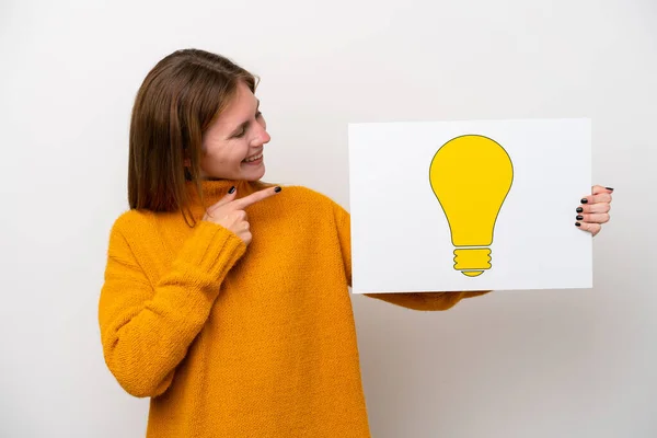 Young English Woman Isolated White Background Holding Placard Bulb Icon — Stock Photo, Image