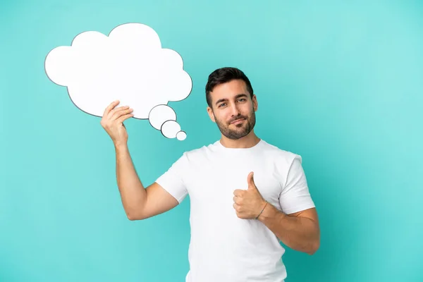 Young Handsome Caucasian Man Isolated Blue Background Holding Thinking Speech — Stok fotoğraf