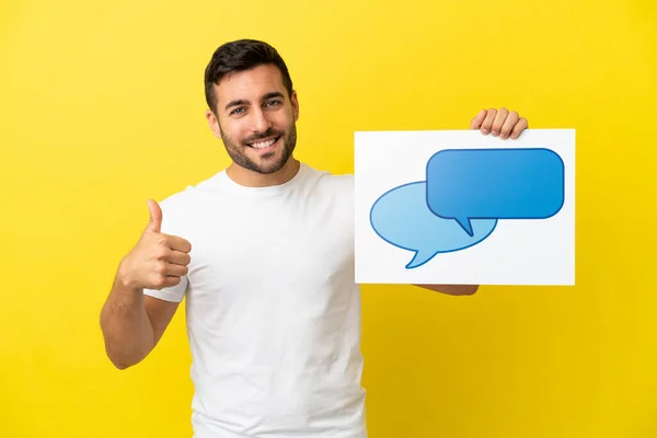 Young Handsome Caucasian Man Isolated Yellow Background Holding Placard Speech — ストック写真