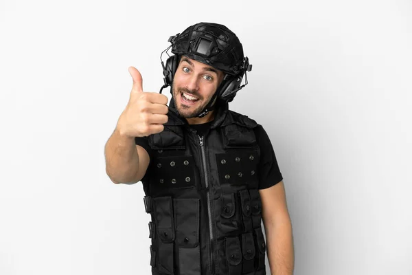 Young Caucasian Swat Isolated White Background Thumbs Because Something Good — Φωτογραφία Αρχείου