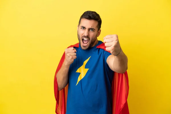 Young Handsome Caucasian Man Isolated Yellow Background Superhero Costume Fighting — Foto de Stock