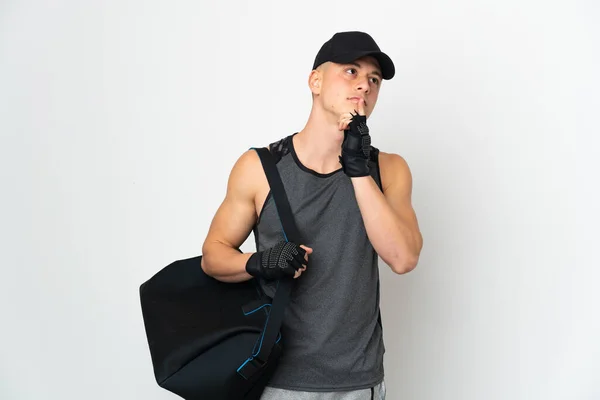 Young Sport Caucasian Man Bag Isolated White Background Having Doubts — Stock fotografie