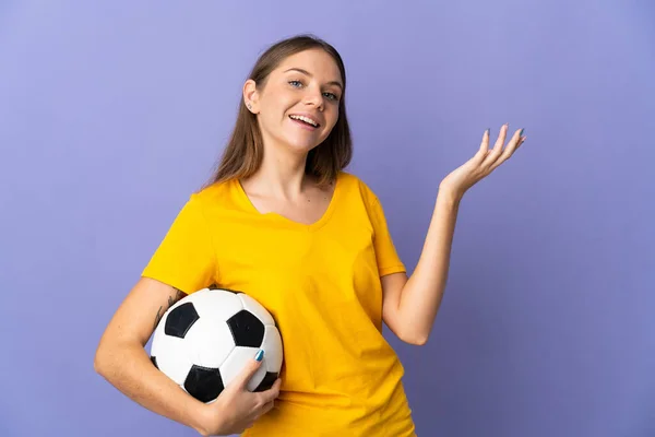 Young Lithuanian Football Player Woman Isolated Purple Background Extending Hands — Zdjęcie stockowe