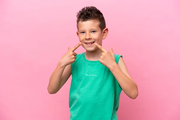 Little Caucasian Boy Isolated Pink Background Giving Thumbs Gesture —  Fotos de Stock