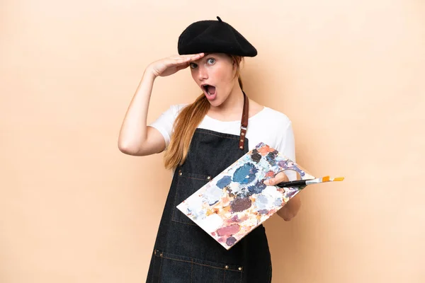 Young Artist Caucasian Woman Holding Palette Isolated Beige Background Doing — Stock Photo, Image