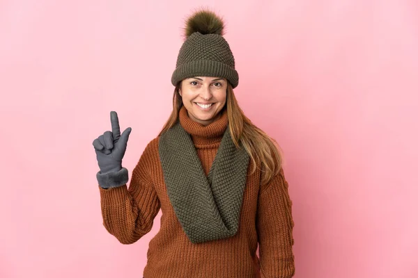 Middle Age Woman Winter Hat Isolated Pink Background Showing Lifting — Stock Photo, Image