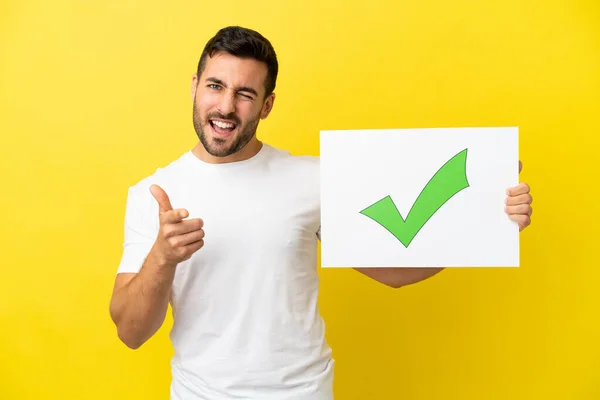 Young Handsome Caucasian Man Isolated Yellow Background Holding Placard Text — Zdjęcie stockowe