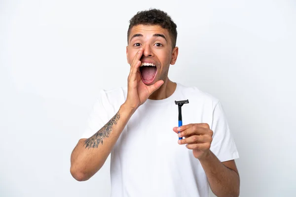 Young Brazilian Man Shaving His Beard Isolated White Background Shouting — 图库照片