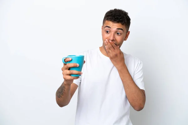 Young Brazilian Man Holding Cup Coffee Isolated White Background Surprise — Zdjęcie stockowe