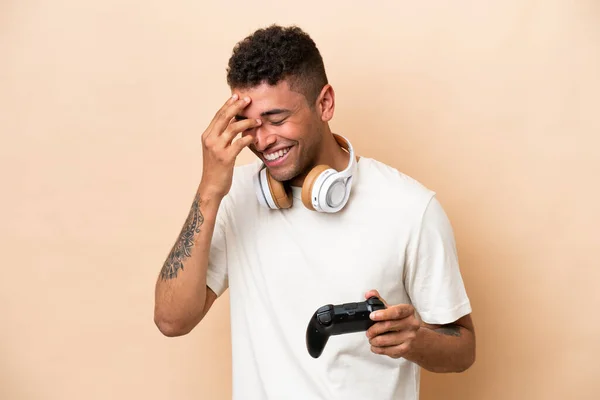 Young Brazilian Man Playing Video Game Controller Isolated Beige Background — 스톡 사진