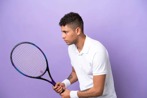 Young Brazilian Man Isolated Purple Background Playing Tennis — Fotografia de Stock