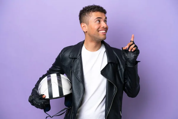 Young Brazilian Man Motorcycle Helmet Isolated Purple Background Pointing Great — Φωτογραφία Αρχείου