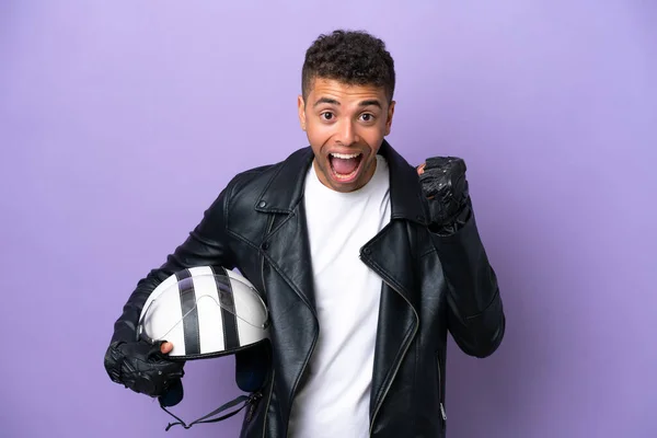 Young Brazilian Man Motorcycle Helmet Isolated Purple Background Celebrating Victory — Φωτογραφία Αρχείου