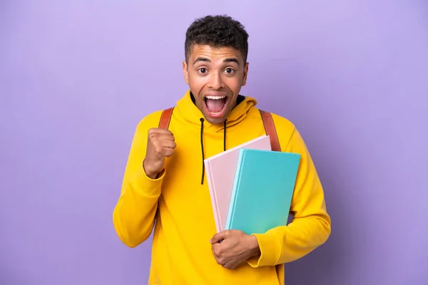 Young Student Brazilian Man Isolated Purple Background Celebrating Victory Winner — 스톡 사진