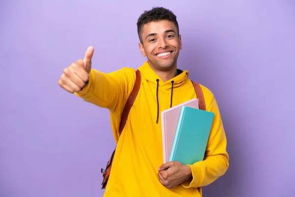 Young Student Brazilian Man Isolated Purple Background Giving Thumbs Gesture — Foto de Stock