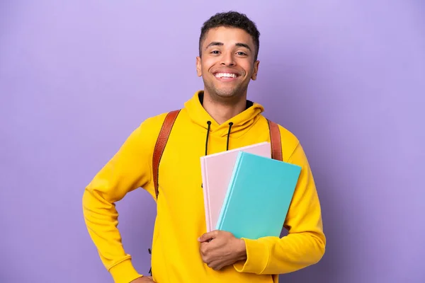 Young Student Brazilian Man Isolated Purple Background Posing Arms Hip — 스톡 사진