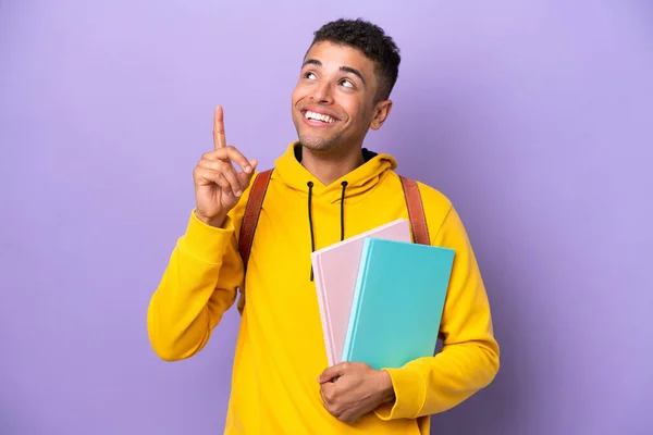 Young Student Brazilian Man Isolated Purple Background Pointing Great Idea — Foto de Stock