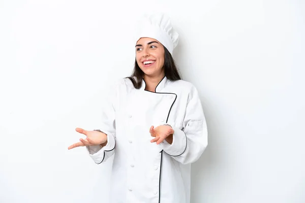 Junge Köchin Frau Über Weißem Hintergrund Mit Überraschendem Gesichtsausdruck — Stockfoto