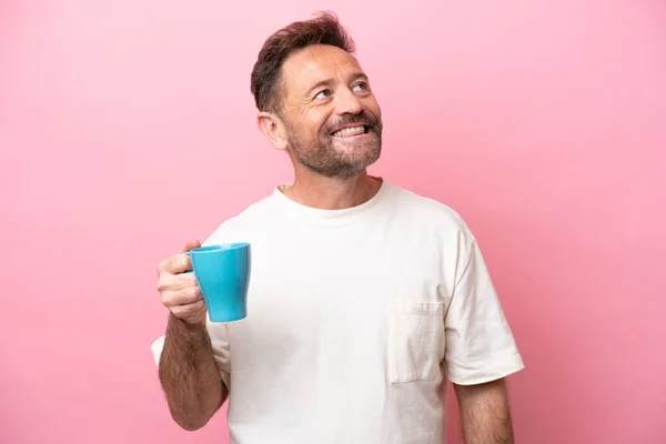 Middle Age Caucasian Man Holding Cup Coffee Isolated Pink Background — Stock Photo, Image