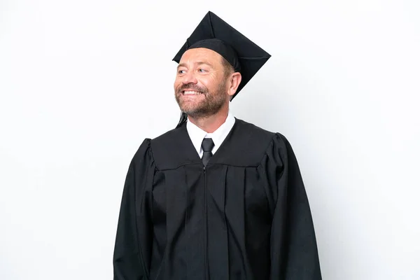 Middelbare Leeftijd Universitair Afgestudeerde Man Geïsoleerd Witte Achtergrond Poseren Met — Stockfoto