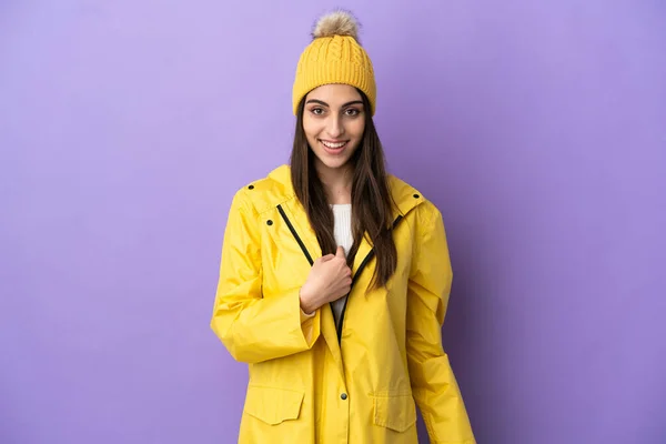 Young Caucasian Woman Wearing Rainproof Coat Isolated Purple Background Surprise —  Fotos de Stock