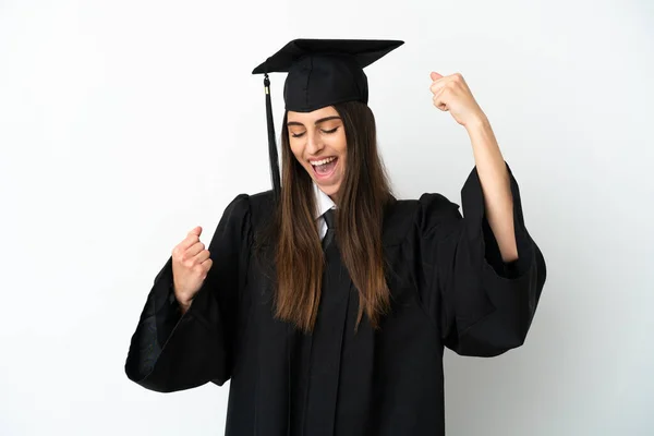 Genç Üniversite Mezunu Beyaz Bir Arkaplanda Zaferi Kutluyor — Stok fotoğraf
