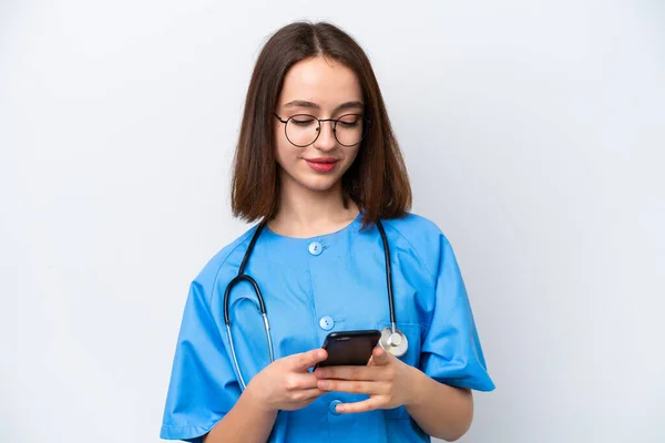Young Nurse Ukrainian Woman Isolated White Background Sending Message Mobile — Stockfoto