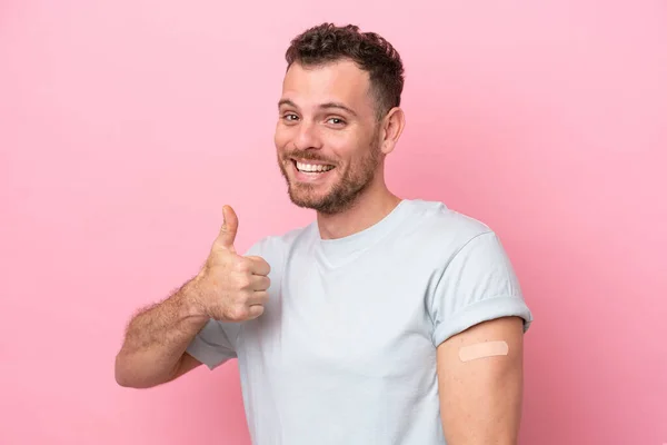 Young Brazilian Man Wearing Band Aids Isolated Pink Background Thumbs —  Fotos de Stock