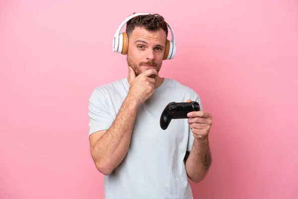 Young Brazilian Man Playing Video Game Controller Isolated Pink Background — Fotografia de Stock