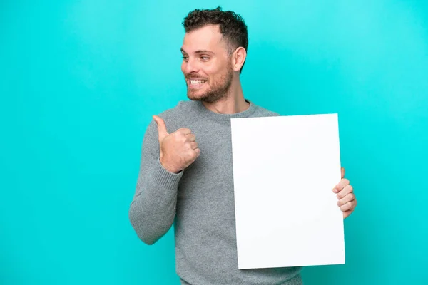 Young Brazilian Man Holding Empty Placard Isolated Blue Background Holding — Foto de Stock