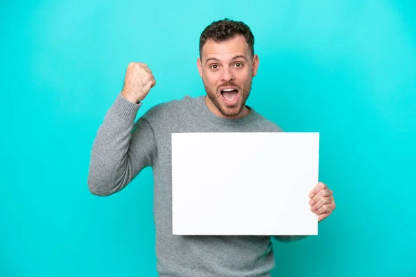 Young Brazilian Man Holding Empty Placard Isolated Blue Background Holding — Stock fotografie