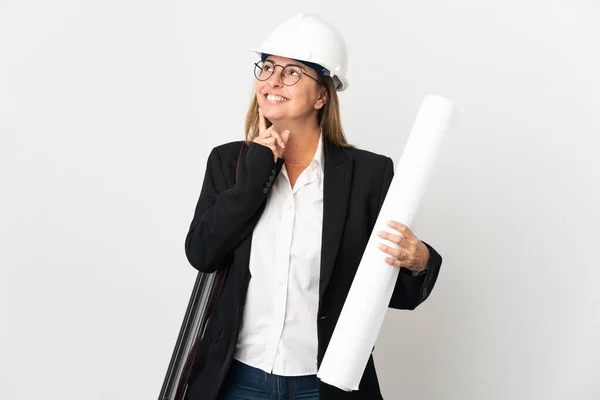 Middle Age Architect Woman Helmet Holding Blueprints Isolated Background Thinking — Stock Photo, Image