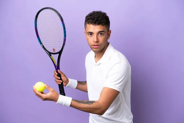 Young Brazilian Man Isolated Purple Background Playing Tennis — Foto de Stock