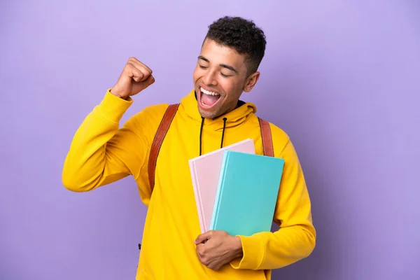 Young Student Brazilian Man Isolated Purple Background Celebrating Victory — 스톡 사진